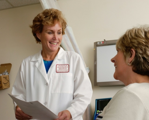 Psychiatrist reviewing patient chart during clinical medication assessment