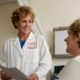 Psychiatrist reviewing patient chart during clinical medication assessment