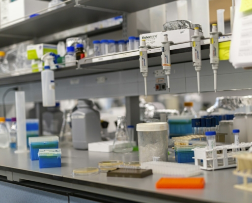 Laboratory bench with scientific equipment for pharmacogenomic testing