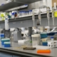 Laboratory bench with scientific equipment for pharmacogenomic testing