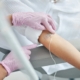 Nurse securing an IV catheter in a patient during a monitored ketamine infusion in a residential mental health setting