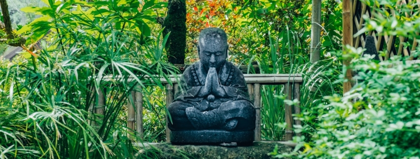 Peaceful garden retreat setting representing the safe, structured environment of residential trauma treatment for severe PTSD