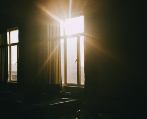 Quiet evening room with warm light, representing the calm structured environment of residential mental health care for treatment-resistant depression